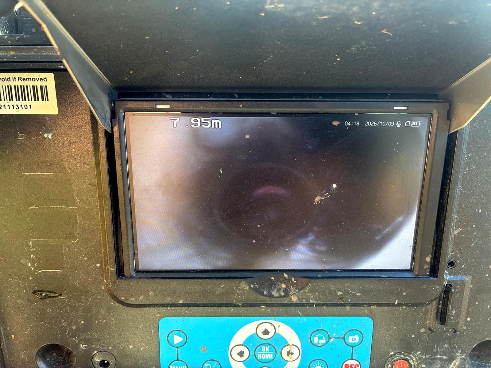 A drain camera monitor showing the inside of a stormwater pipe at 7.95 metres along the line